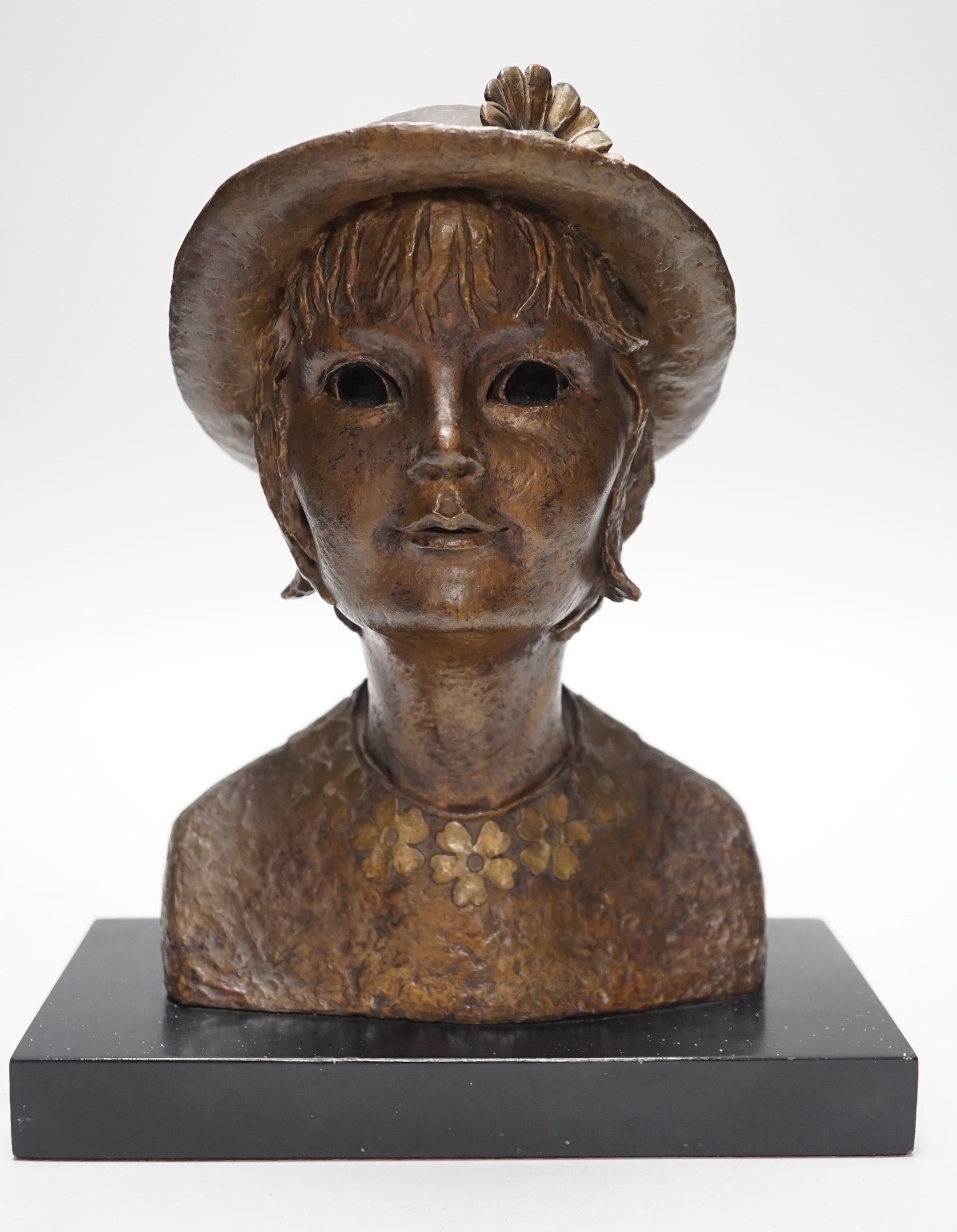 A bronze portrait bust, believed to be film director's wife, Mo Endfield, 27cms high
